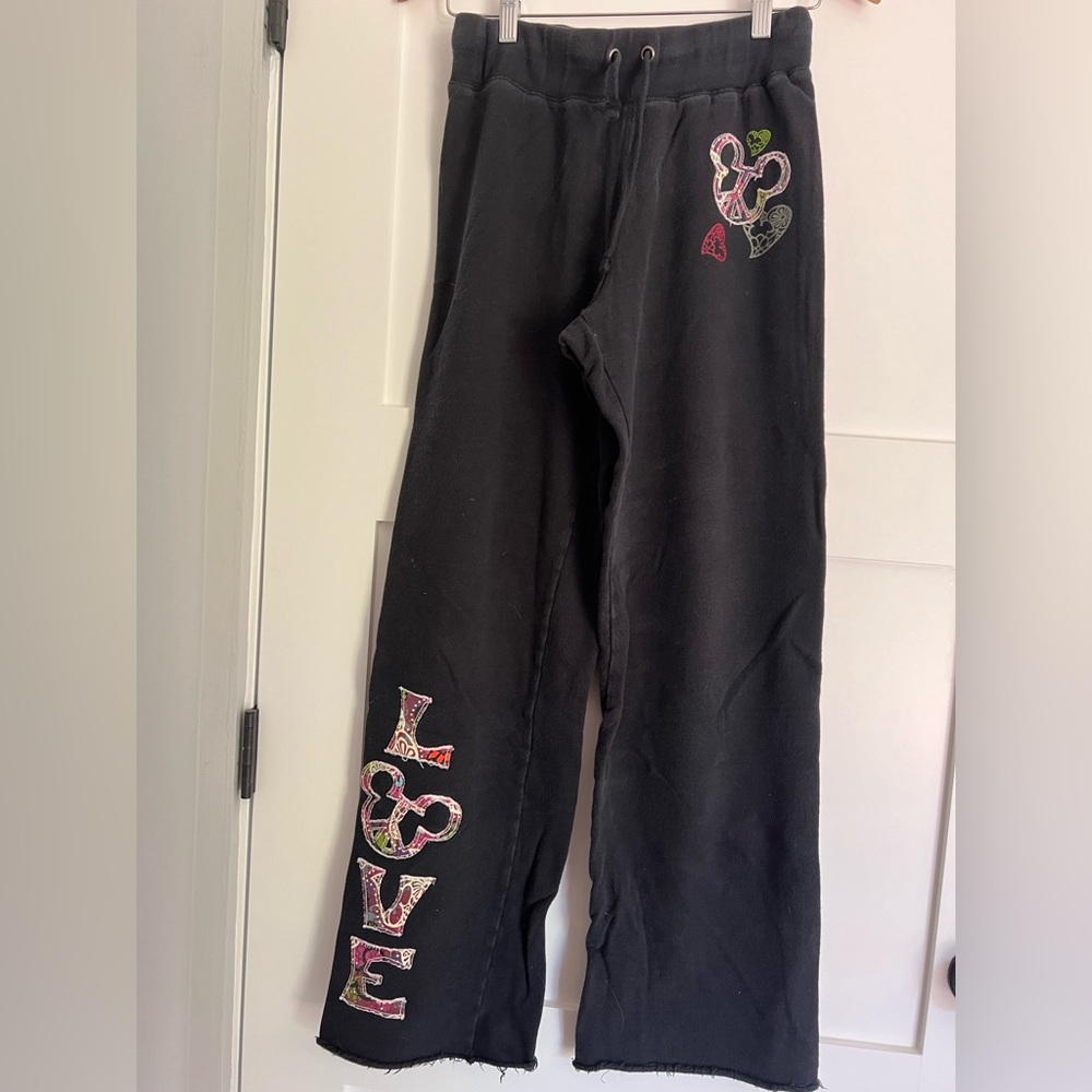 Disney drawstring sweatpants with adorable Mickey love and peace signs.